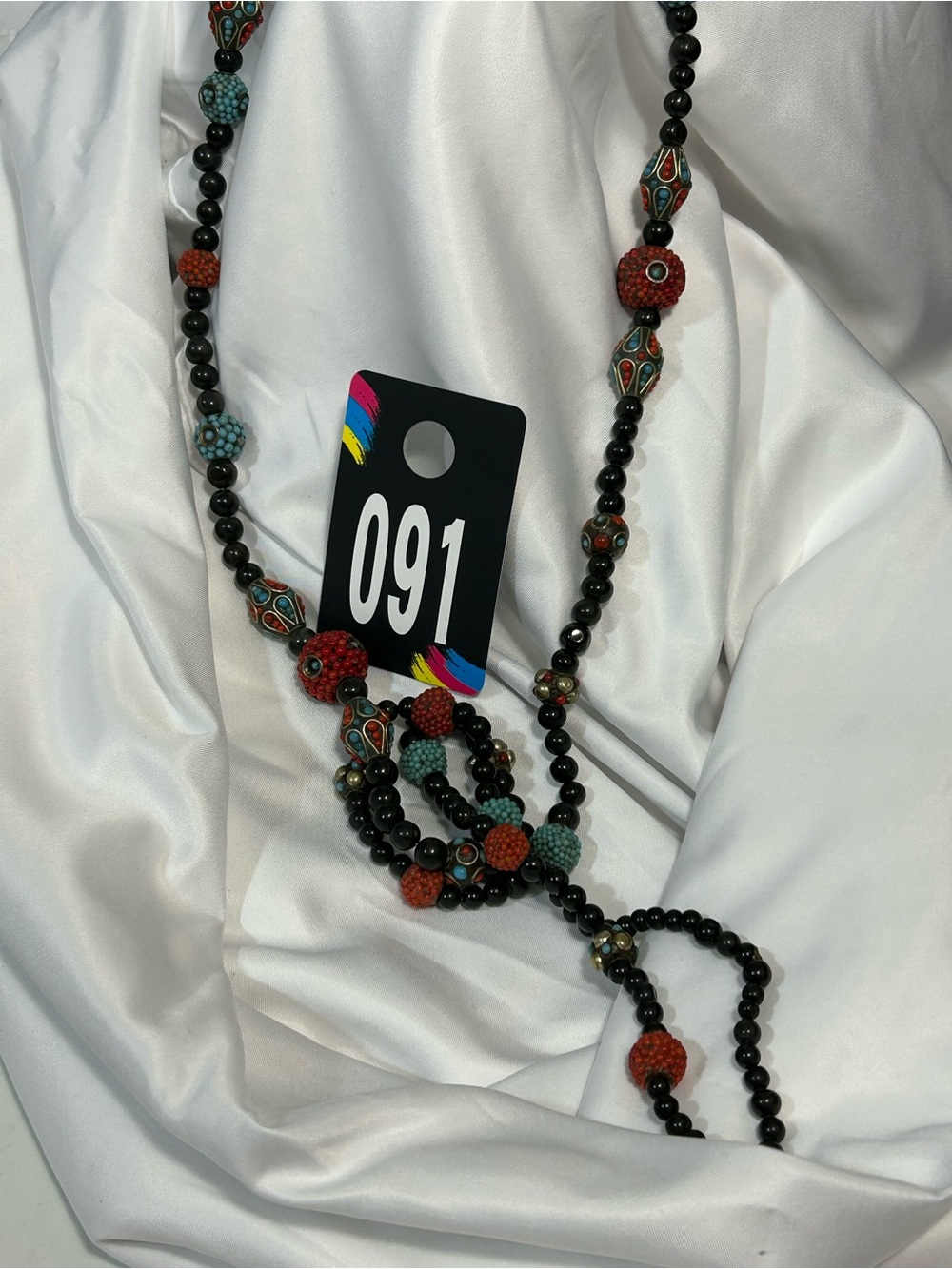 Black Beaded Necklace with Red and Turquoise Accent Beads